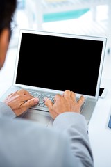 Businessman using his laptop 