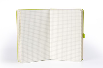 Notepad with a checkered sheets on white background.