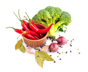 Vegetables and spices on a white background