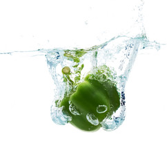 pepper falling or dipping in water with splash