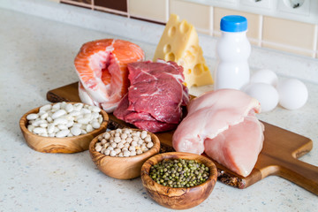 Selection of protein sources in kitchen background