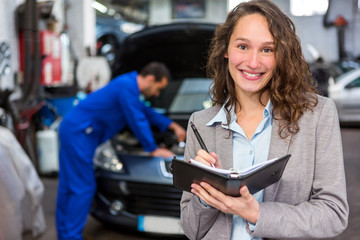 Expert in autobile working in a garage