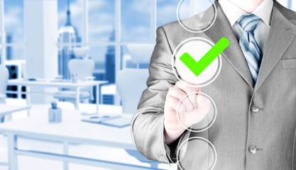 business man touching, pressing modern button with green ticking Check Box.