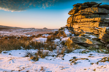 Snowy morning at rocky hills