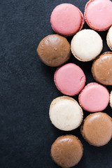Macarons on dark background
