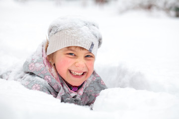 Child enjoying a wintertime