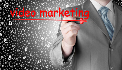 business man writing Video Marketing