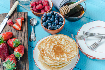 Pancakes for brunch with berry fruits