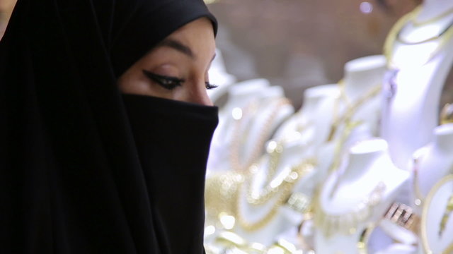 Steadycam, Woman with headscarf shopping at Grand Bazaar, Istanbul, Turkey