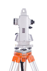 Survey equipment theodolite on a tripod. Isolated on white