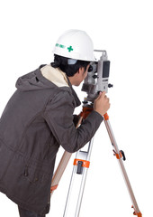 engineer working with survey equipment theodolite