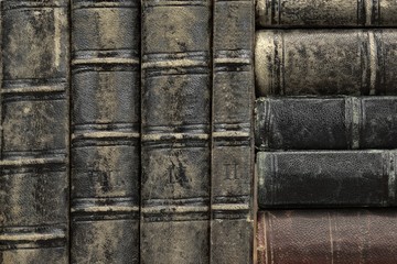 Old Shabby Books With Black Leather Cover Horizontal Background