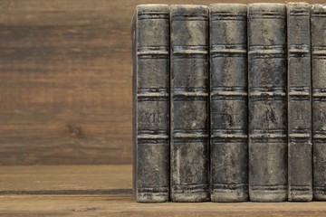 Five Old Shabby Books With Black Leather Cover Horizontal Backgr
