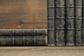 Six Old Shabby Books With Black Leather Cover Horizontal Backgro