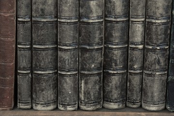 Old Shabby Books With Black Leather Cover Horizontal Background