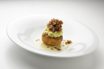 Appetizer Potato cream puff of white butter cinnamon tartare