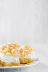 Fresh profiteroles with cream
