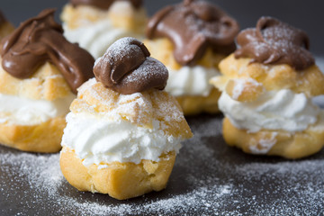 Profiteroles with cream and chocolate
