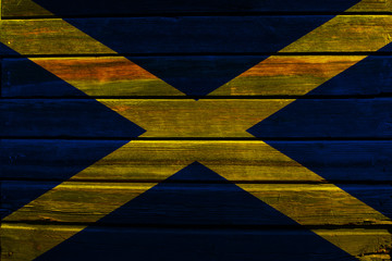 Flag of Scotland on wood