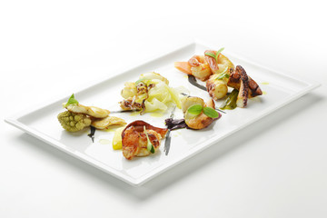 Palette of sea fish with sweet and sour vegetables