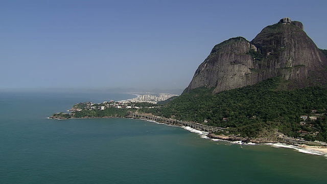 Flying above the ocean to reveal Barra da Tijuca, Rio de Janeiro, Brazil