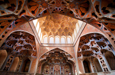 Fantastic ceiling and patterns in music instruments shapes in palace Ali Qapu in Iran