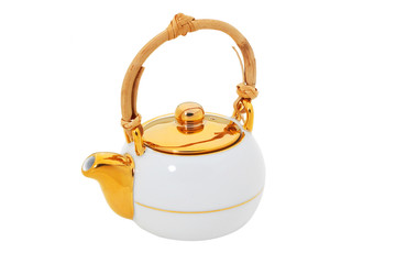 White teapot with wooden handle  isolated