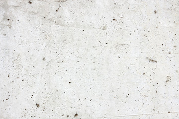 Fototapeta premium light concrete with holes as a background