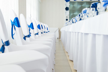 blue and white interior of the restaurant.
Restaurant interior with blue and white colour scheme
