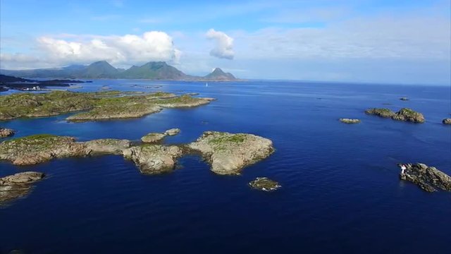 Aerial footage of small rocky islets near port of Ballstad on Lofoten islands in Norway. Aerial 4k Ultra HD.
