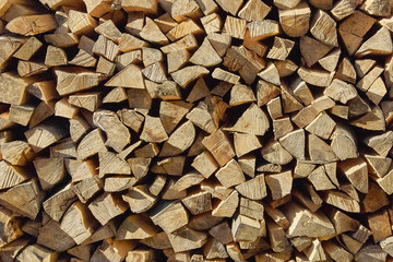 Background of dry chopped firewood