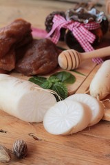 Fresh radish and pickled radish for cooking.