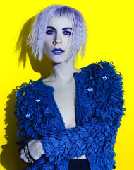 Fototapeta premium Blonde girl in club style. fashion party
