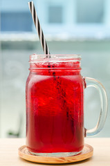 Ice red drink in the glass