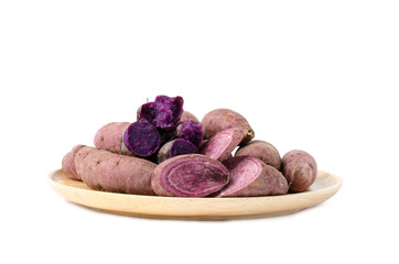 Raw and ripe sweet potatoes on white background