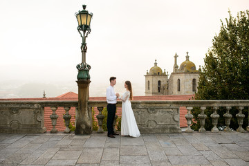 Newlyweds on background of the city Porto
