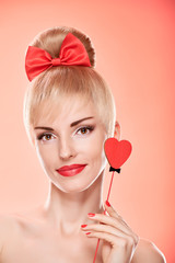 Beauty woman smiling with red heart.Valentines Day