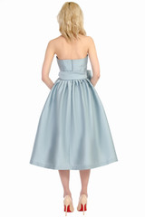 Girl in dress from the back isolated on white