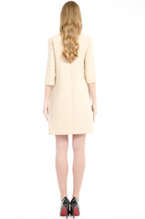 Girl in dress from the back isolated on white