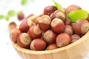 Hazelnuts in a wooden bowl