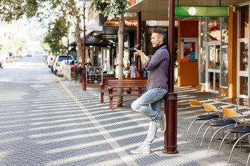 Male photographer taking picture