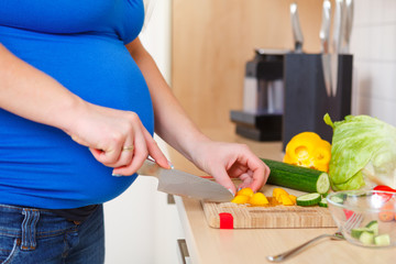 pregnant woman with healthy food