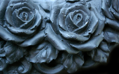 Embossed black roses background
