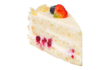 piece of cake on white plate with strawberries