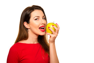 Positive Female Biting a Big Green Apple Fruit Smiling on White