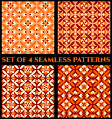 Collection of 4 stylish decorative seamless patterns with geometric ornament of red, orange and white shades