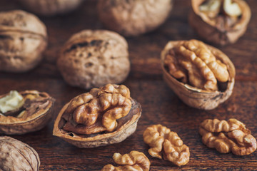 Walnuts on wooden background