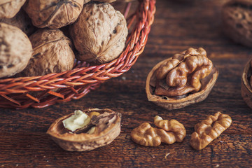 Walnuts on wooden background