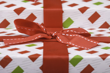 gift wrapping with a red bow