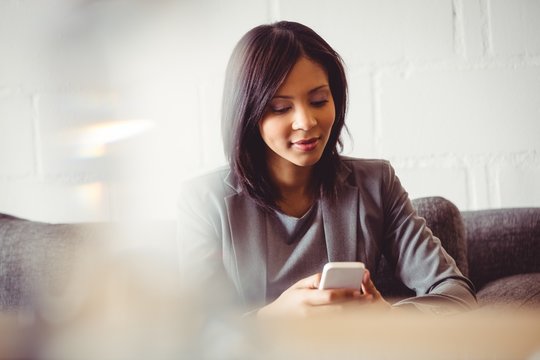 Businesswoman using smartphone
